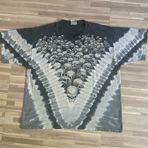 Vintage Liquid Blue skull with the red eye. Lic and dated 98. 24w 27L